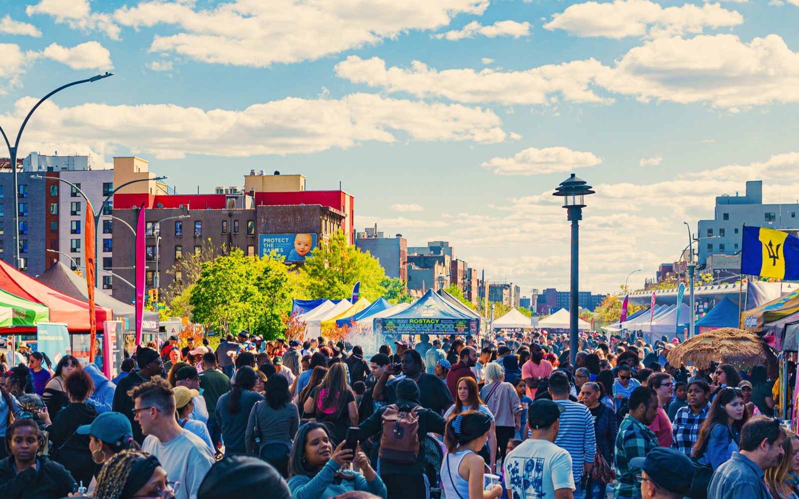 Crowds packing 161st Street and Grand Concourse at Bronx Night Market