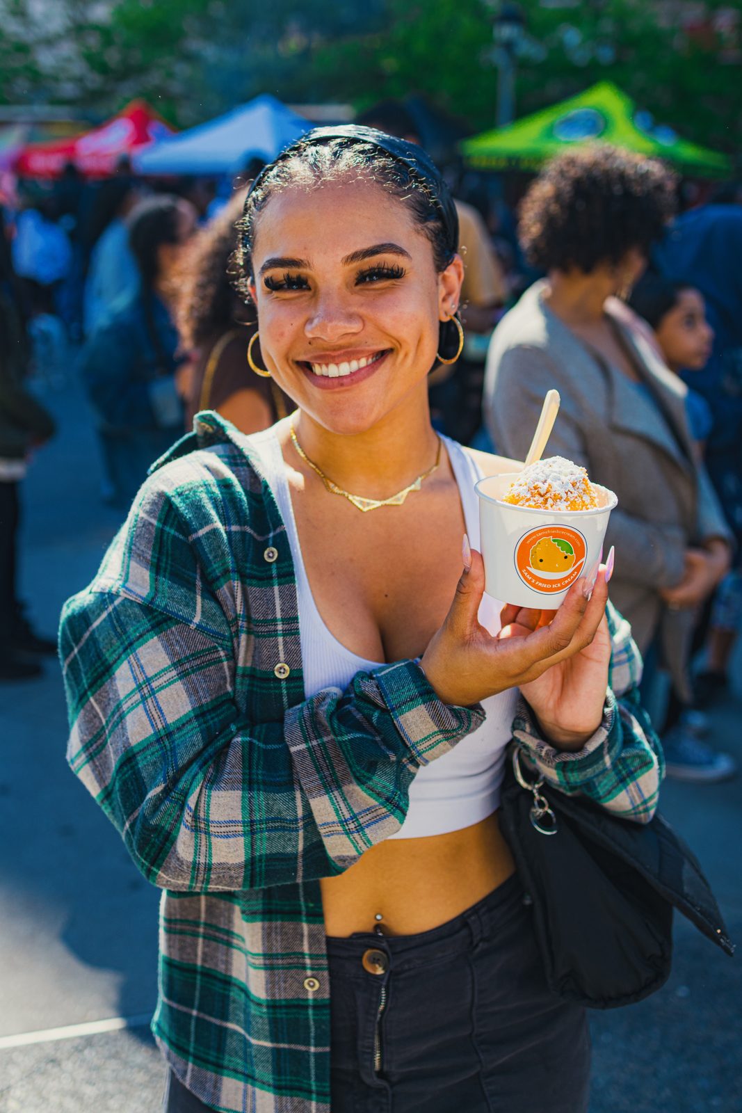 Attendee holding fried ice cream